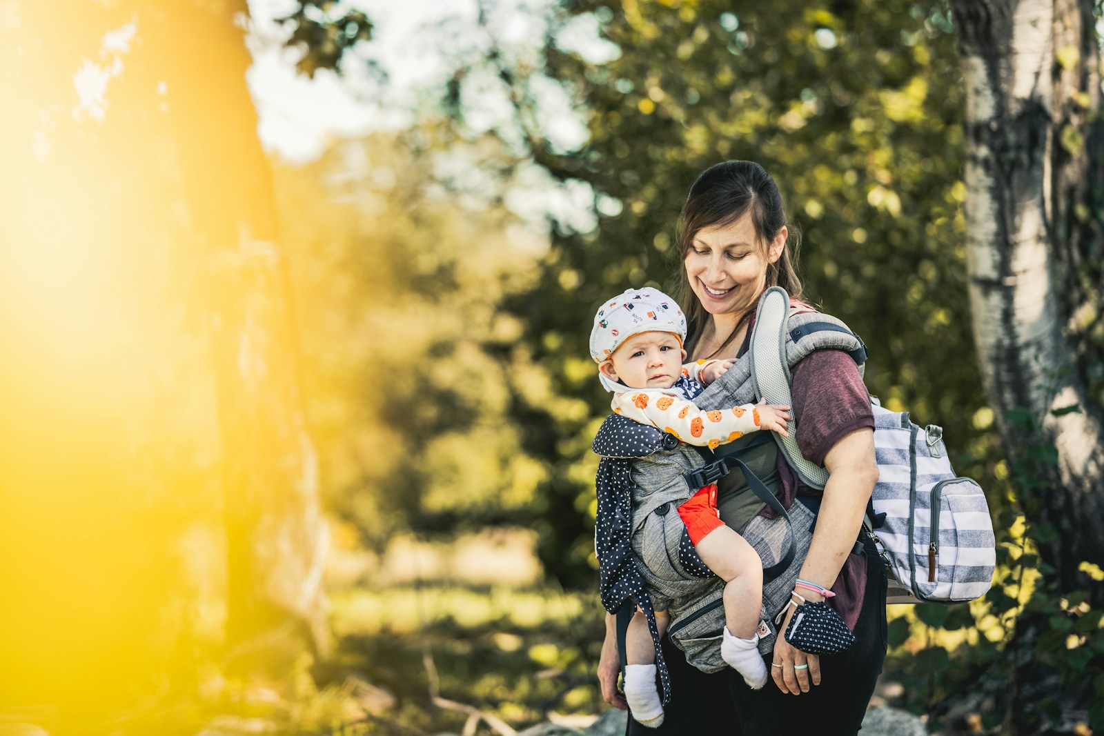 a woman holding a child in her arms